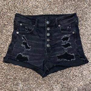 American Eagle / size: 6 / black, buttoned, stretch, ripped, high waisted shorts
